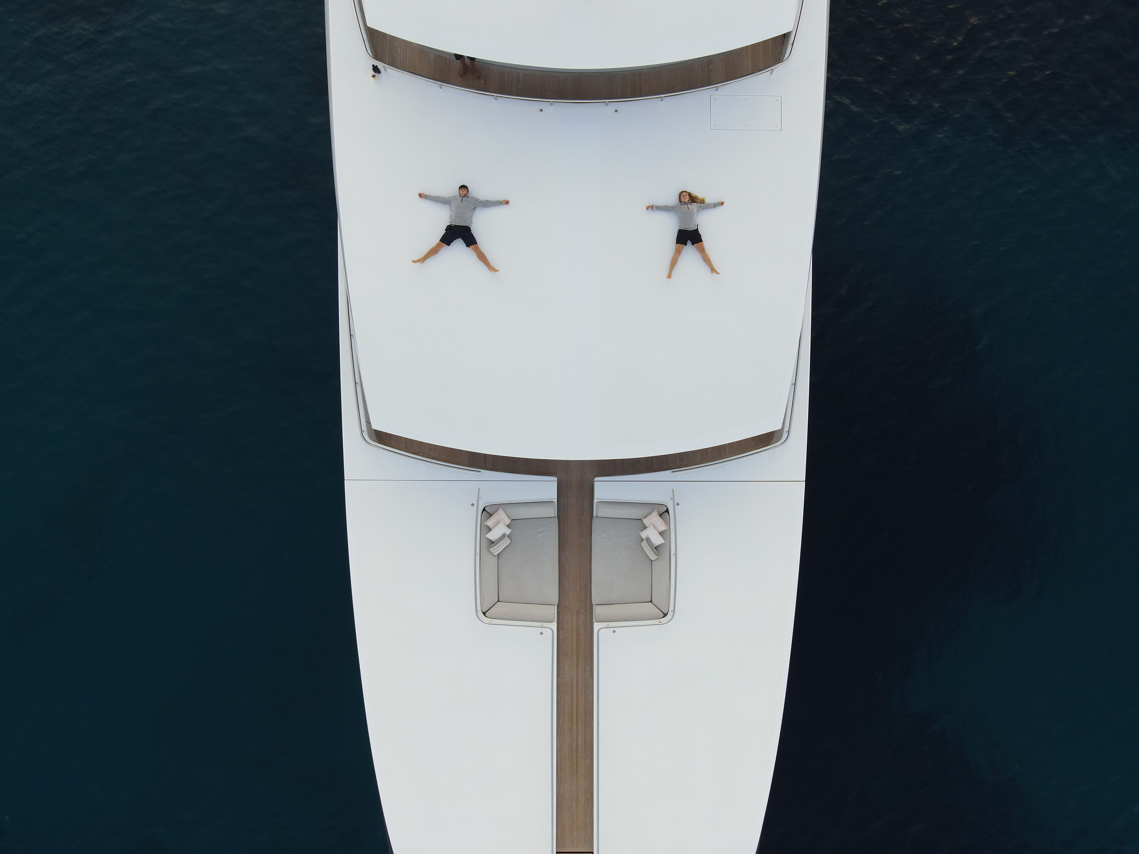 Crew Relaxing On Superyacht Chamois Crew phillipdavies